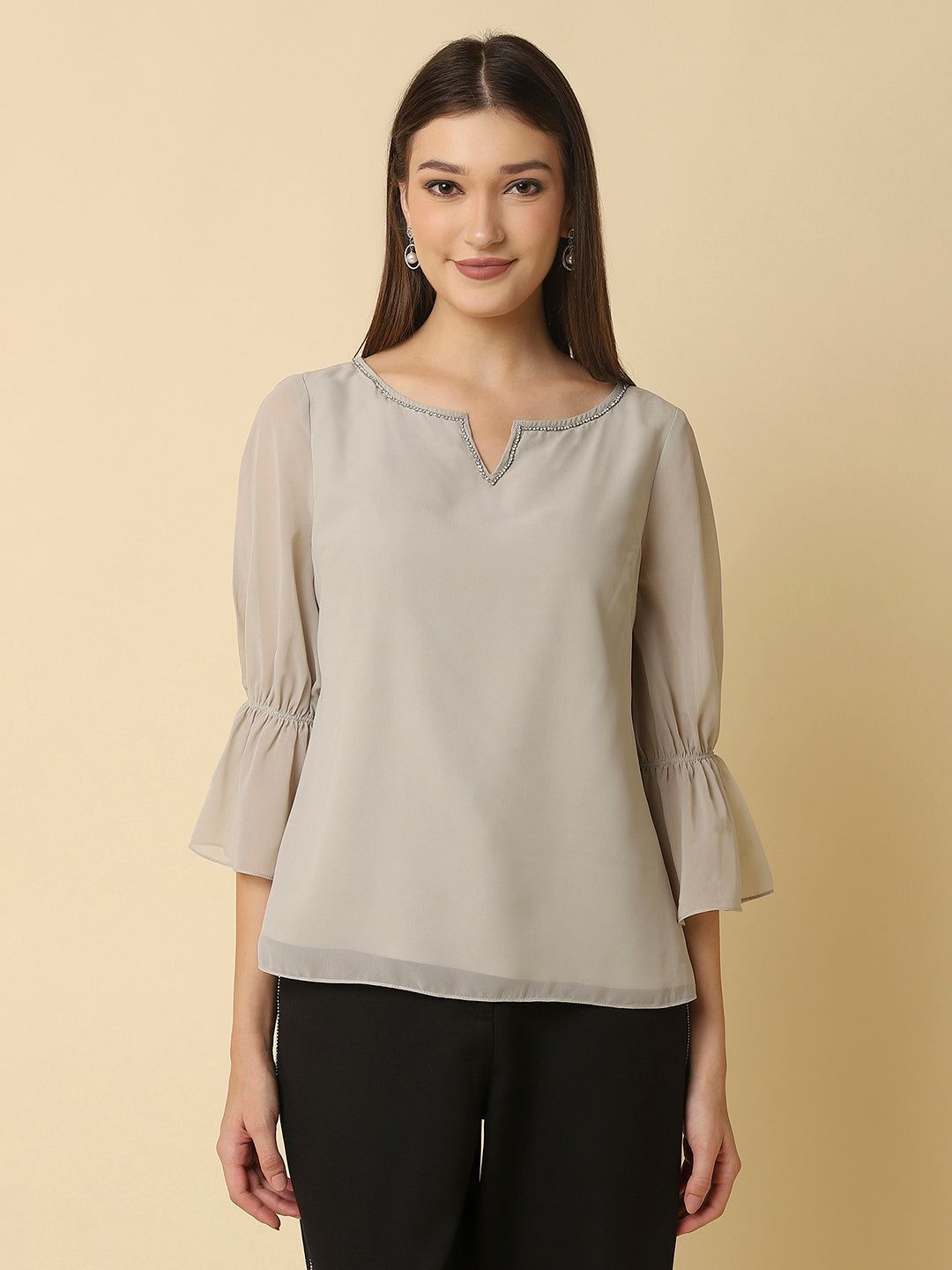 stygian beige top