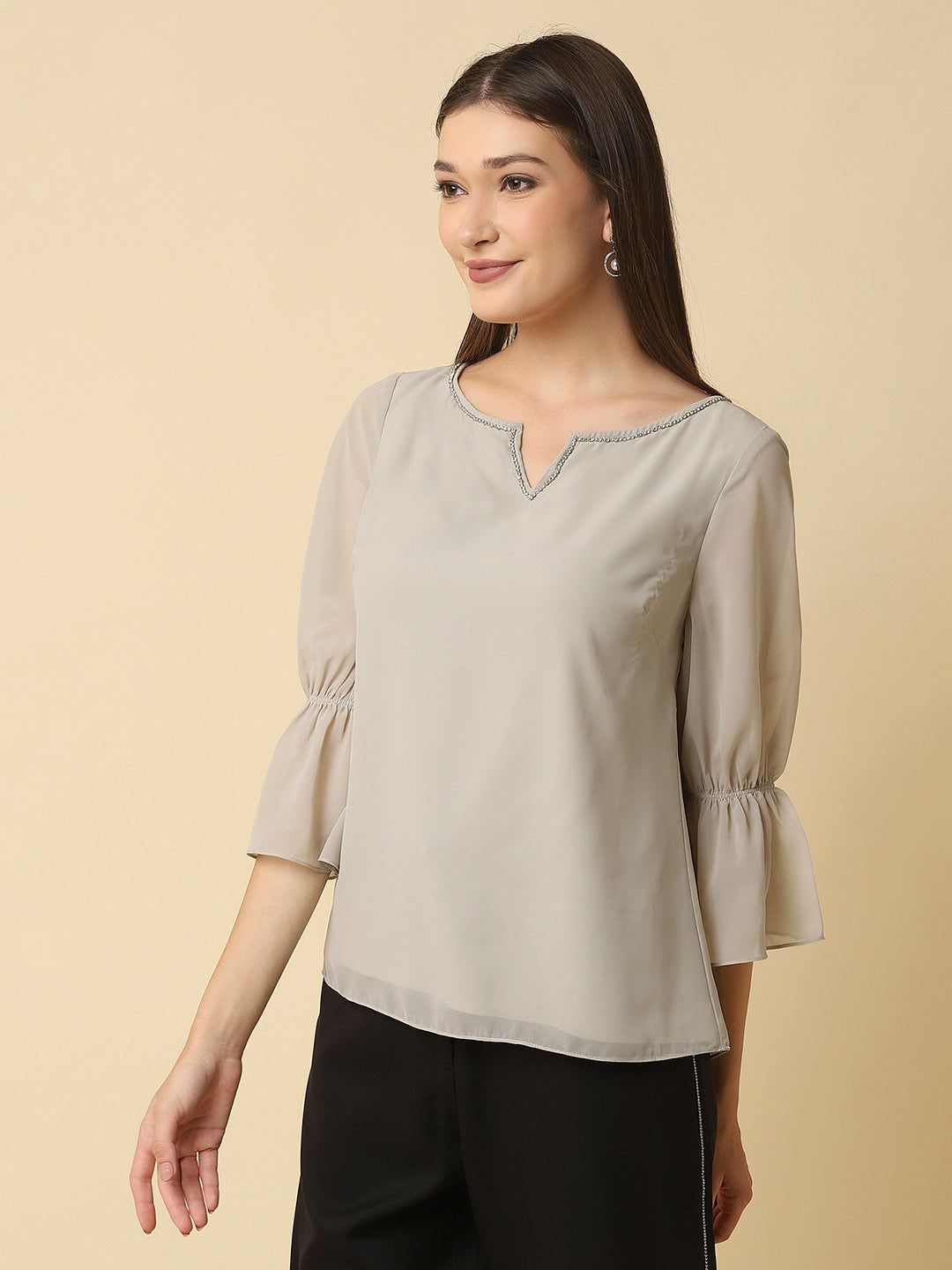 stygian beige top