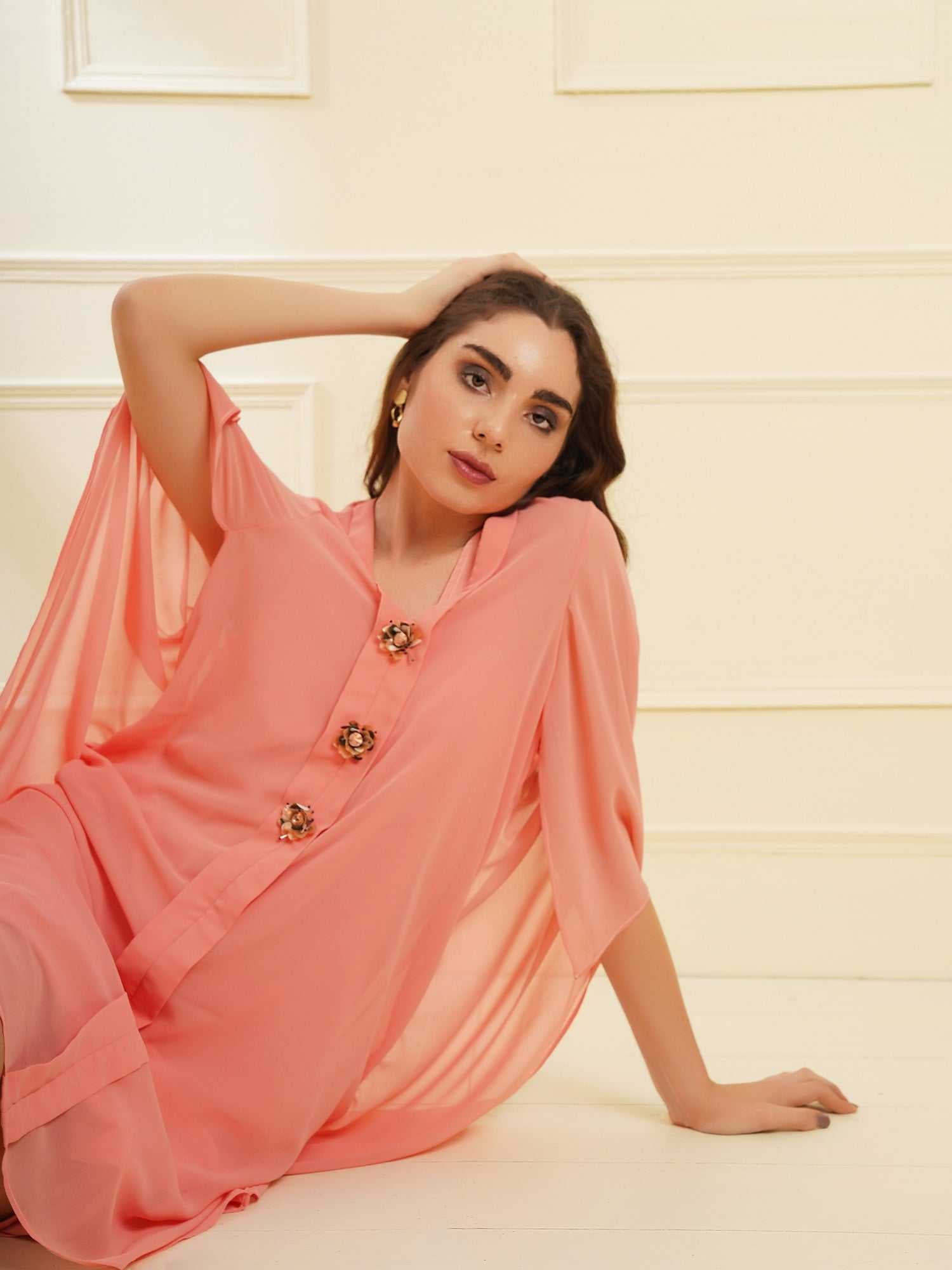 peach dress with placket embellishment